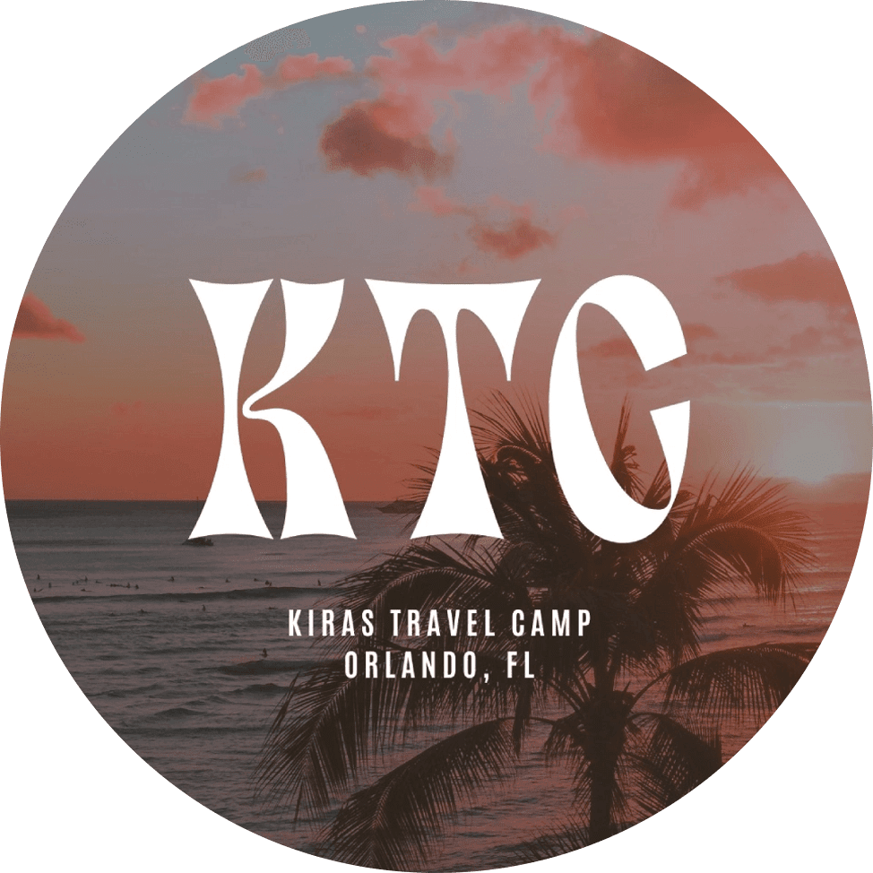 Logo for KTG Kiras Travel Camp with a sunset background.